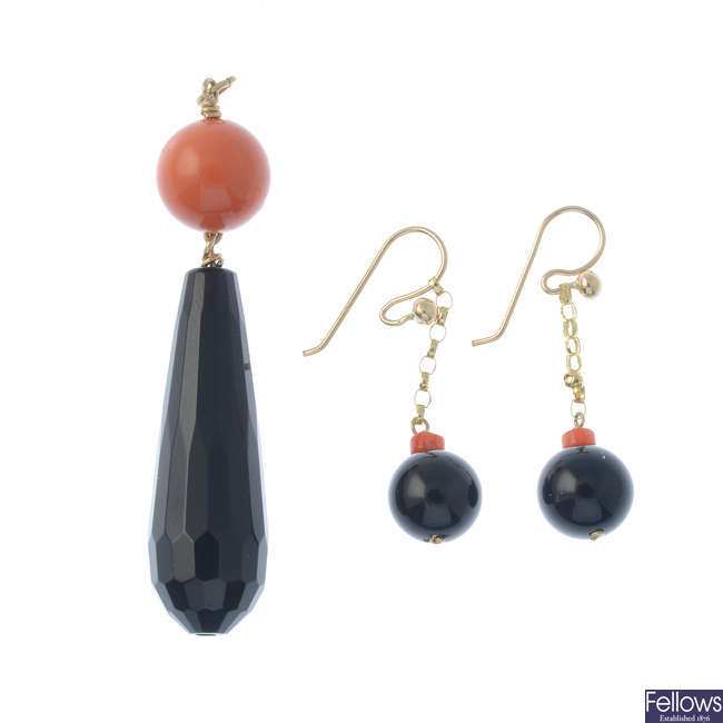 A set of coral and onyx jewellery.