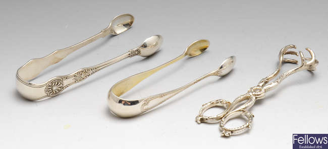 A pair of mid-Victorian silver scissor action claw grip sugar nips, etc.