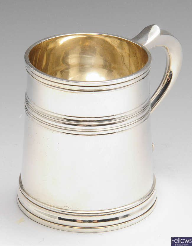 An early twentieth century silver mug.