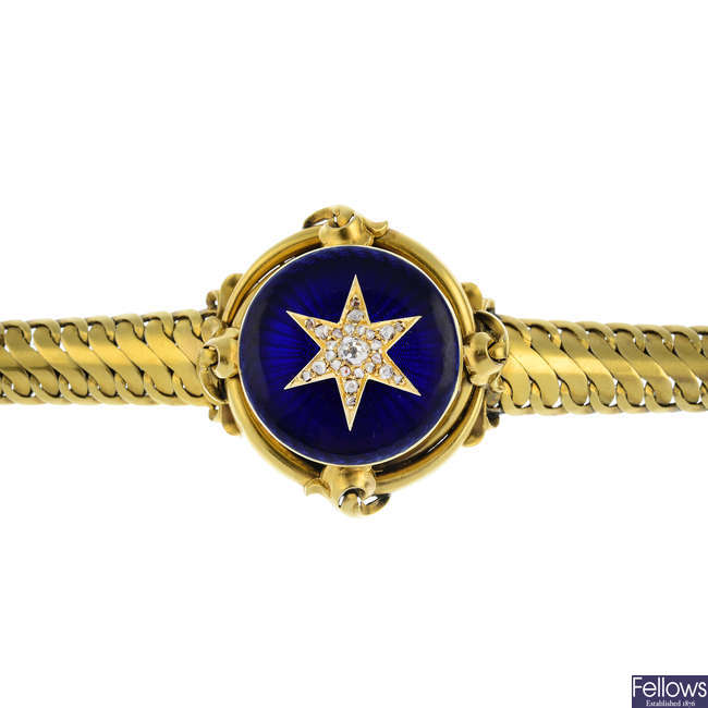 A mid Victorian gold diamond enamel locket bracelet.
