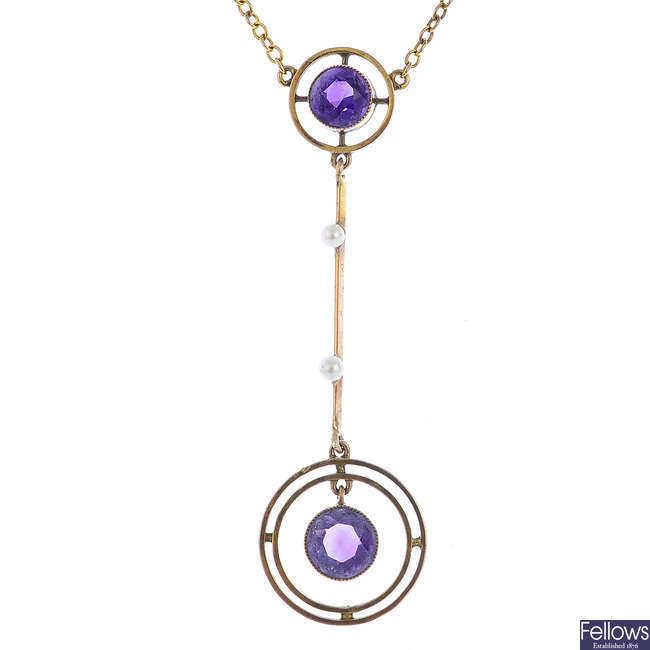 An early 20th century gold amethyst and seed pearl necklace.