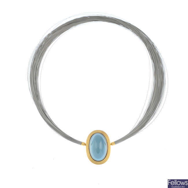 An 18ct gold and metal, aquamarine wire necklace.