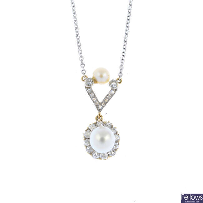 A pearl and diamond pendant necklace.