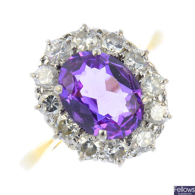 A synthetic colour-change sapphire and diamond cluster ring.