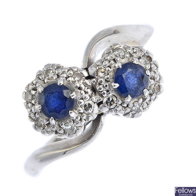 A diamond and sapphire ring.