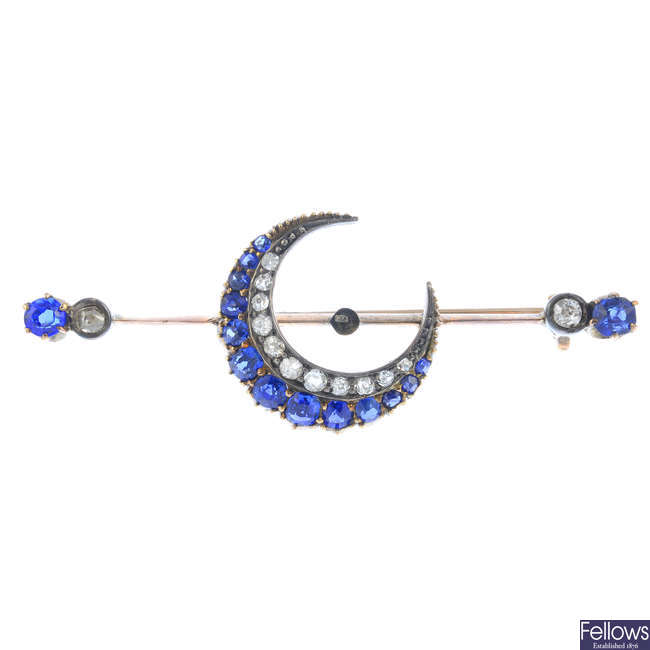 A late Victorian gold sapphire and diamond crescent bar brooch.