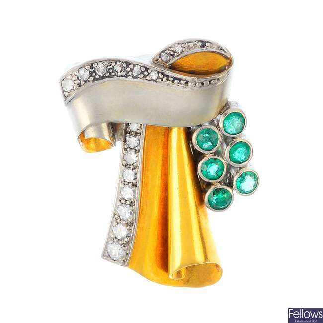 A mid 20th century emerald and diamond clip.