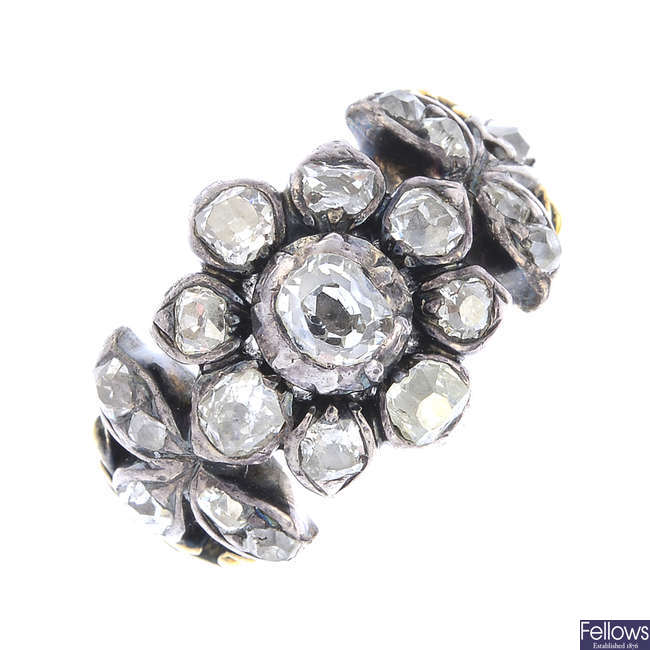 A Georgian silver and gold foil-back diamond floral dress ring.