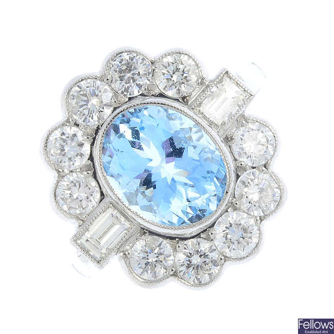 An aquamarine and diamond cluster ring.