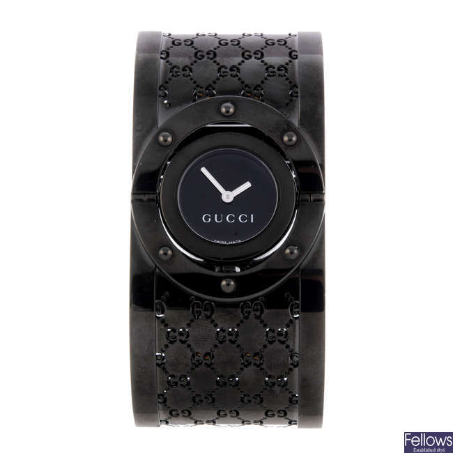 GUCCI - a lady's PVD-treated stainless steel Twirl bangle watch.
