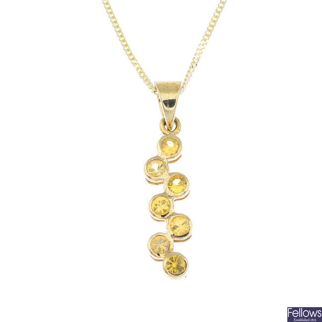 A 9ct gold sapphire pendant, with a 9ct gold chain.