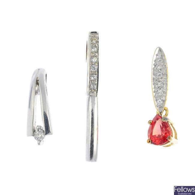Three diamond and sapphire pendants.