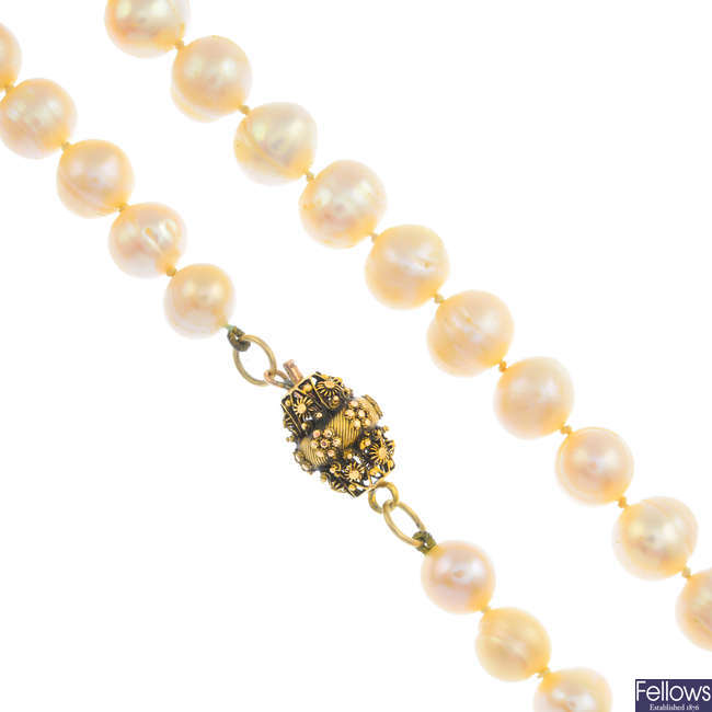 A cultured pearl single-strand necklace, with early 19th century gold barrel clasp.