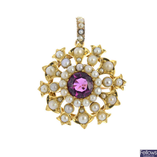 An early 20th century 12ct gold tourmaline and split pearl pendant.