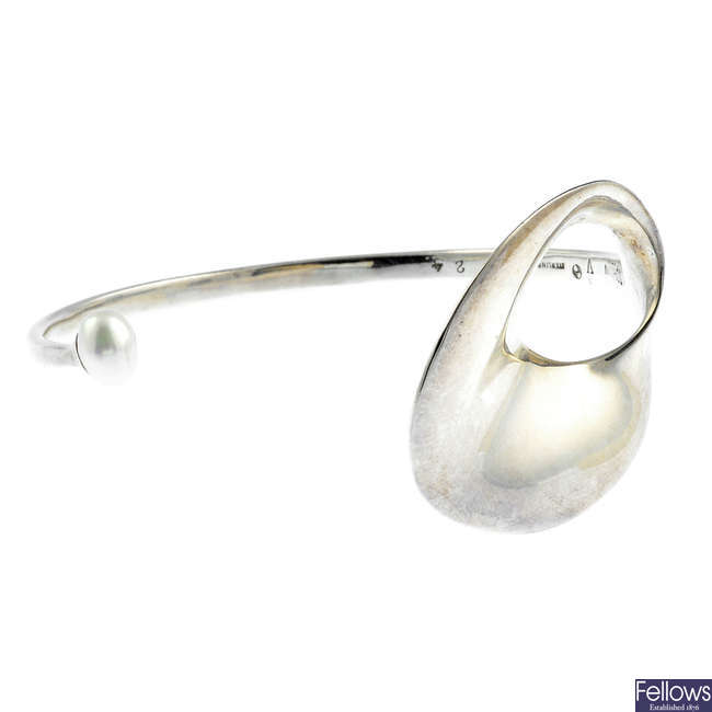 GEORG JENSEN - a silver cultured pearl bangle, no. 7424.