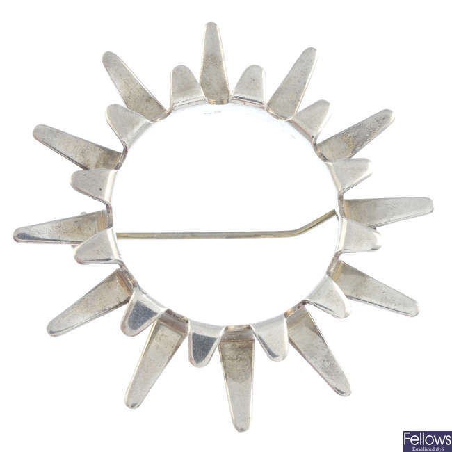 PLUS - a 1960s silver 'sun' brooch, by Tone Vigeland, for Plus.