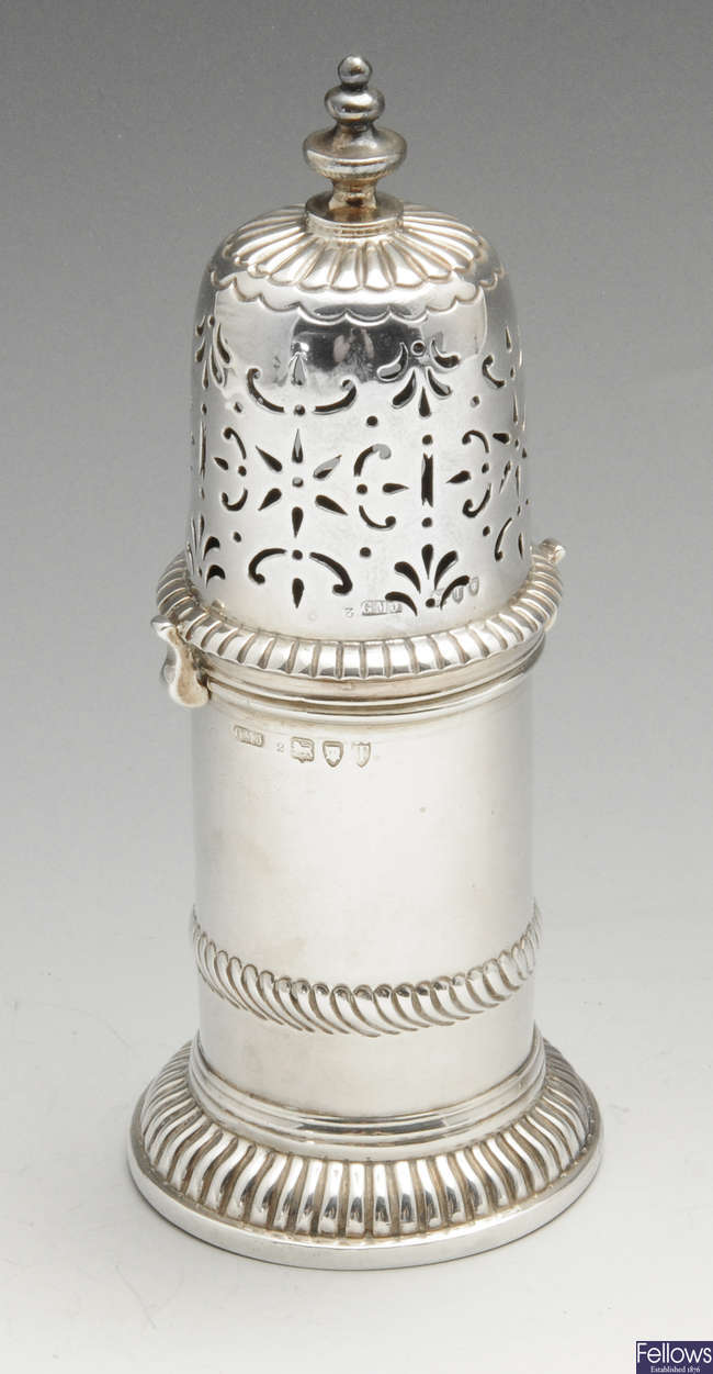 A late Victorian silver caster of lighthouse form. 