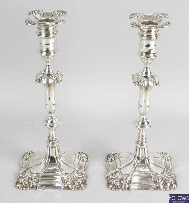  A pair of Edwardian silver candlesticks in Georgian style.