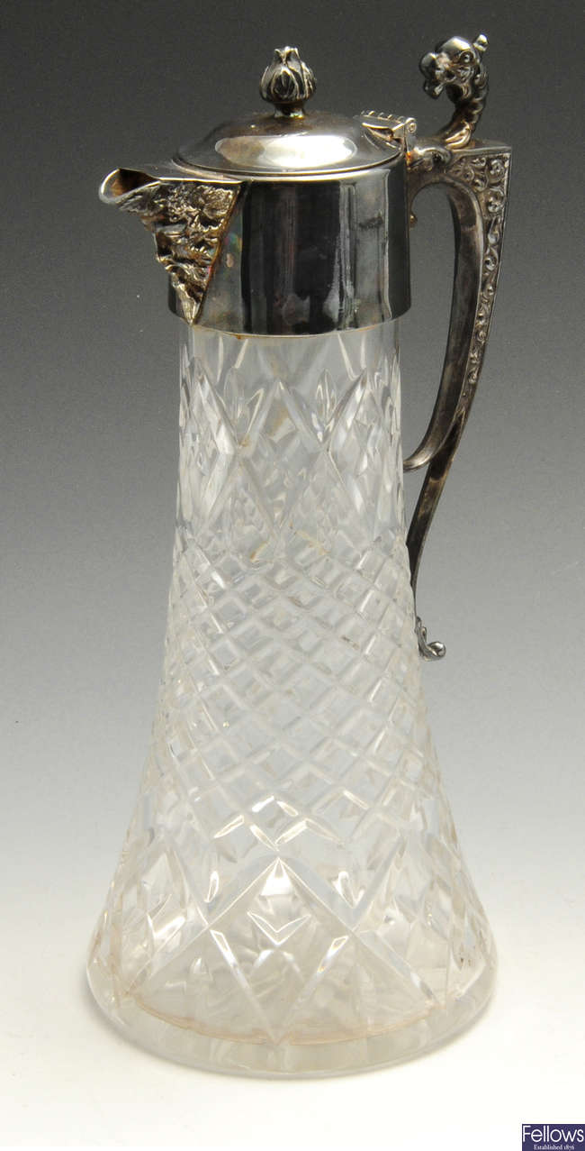 A modern silver mounted claret jug.