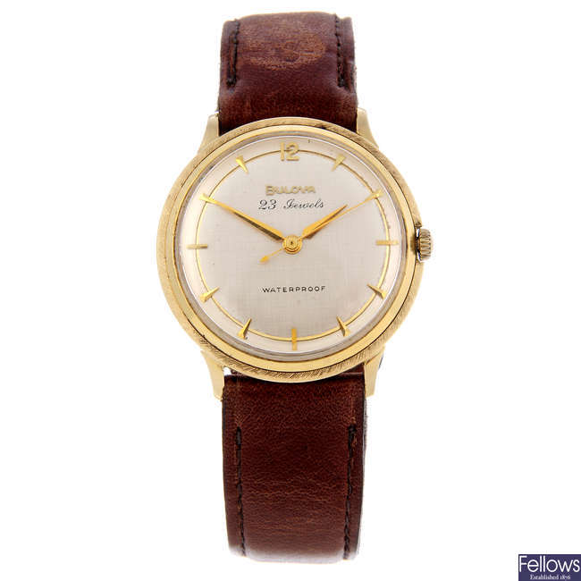BULOVA - a gentleman's yellow metal wrist watch.