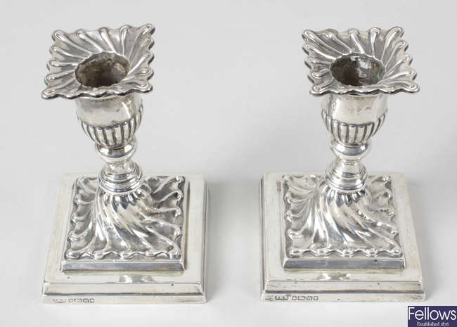 A pair of Victorian silver dwarf candlesticks.