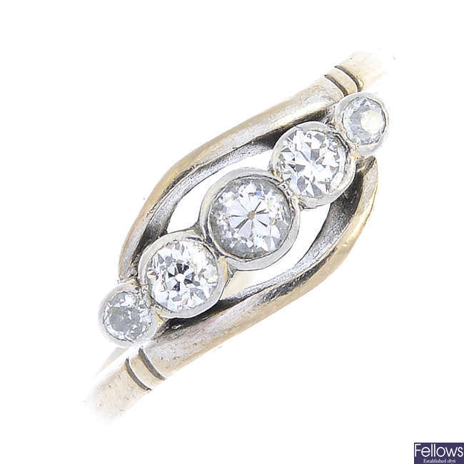 A mid 20th century gold diamond five-stone ring.