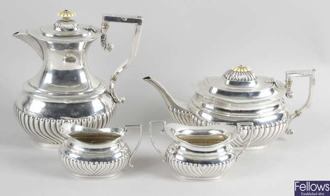 An Edwardian & later matched four piece silver tea service.