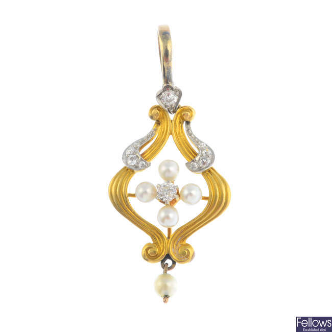 An early 20th century gold, diamond and seed pearl pendant.
