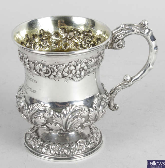 A George IV silver christening mug.