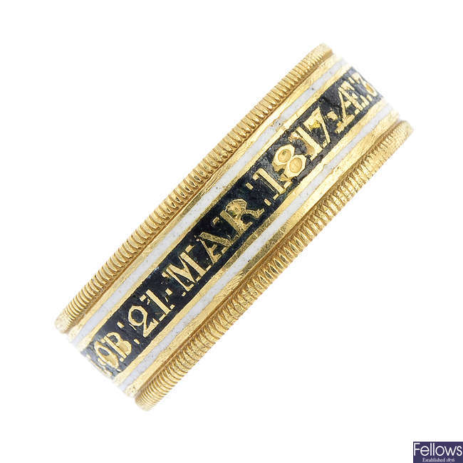 A late Georgian 18ct gold enamel memorial band ring.