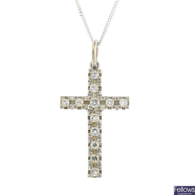 A diamond pendant, with 9ct gold chain.
