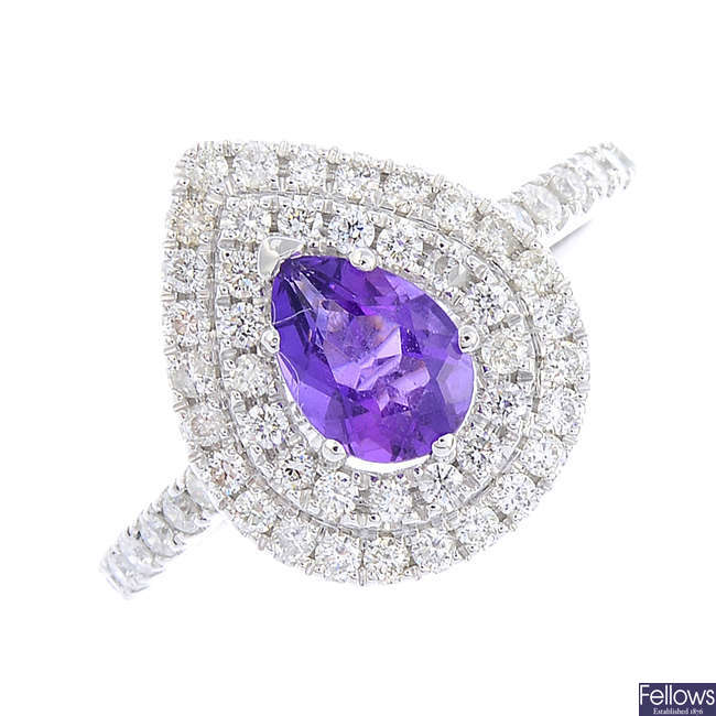 An amethyst and diamond cluster ring.