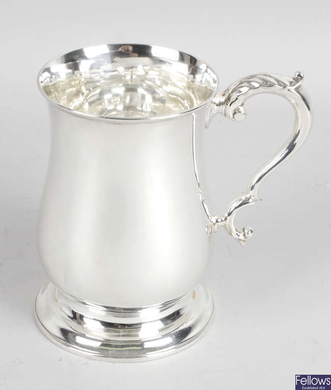 A late Victorian silver mug in Georgian style.