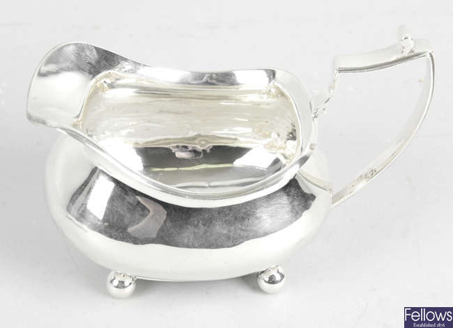 A George III silver cream jug. 