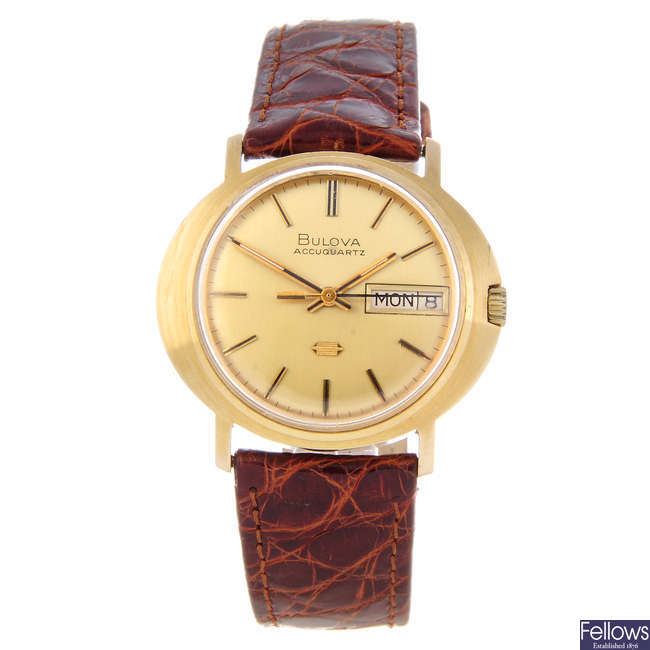 BULOVA - a gentleman's 9ct yellow gold Accuquartz wrist watch.