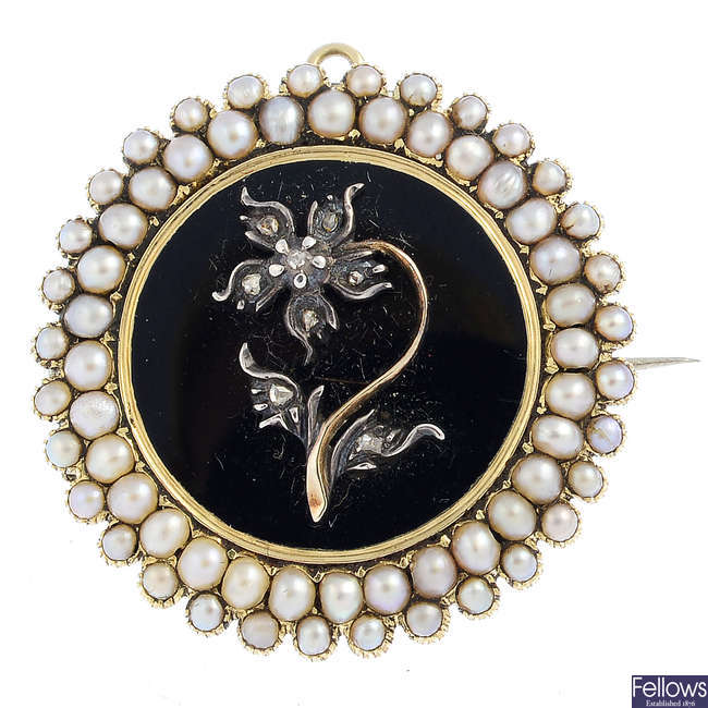 A mid Victorian gold diamond and split pearl mourning brooch.