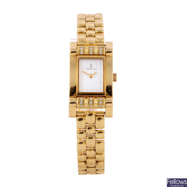CORUM - a lady's 18ct yellow gold Tabogan bracelet watch.