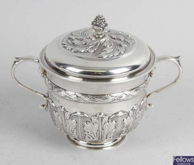 A 1920's small silver cup & cover.