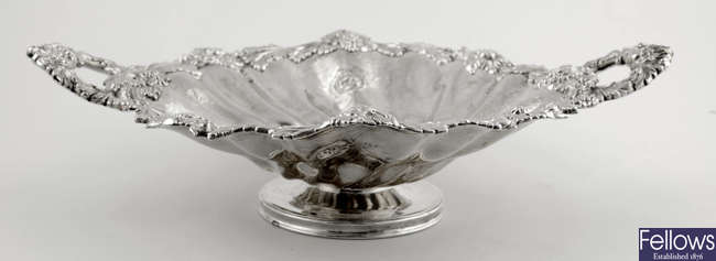 A William IV silver twin-handled dish. 