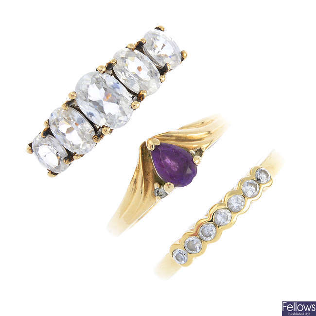 Three 9ct gold cubic zirconia and amethyst rings.