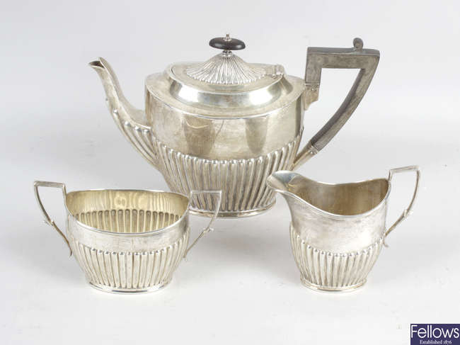 An Edwardian silver three piece tea set.