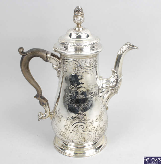 A George II silver coffee pot. 