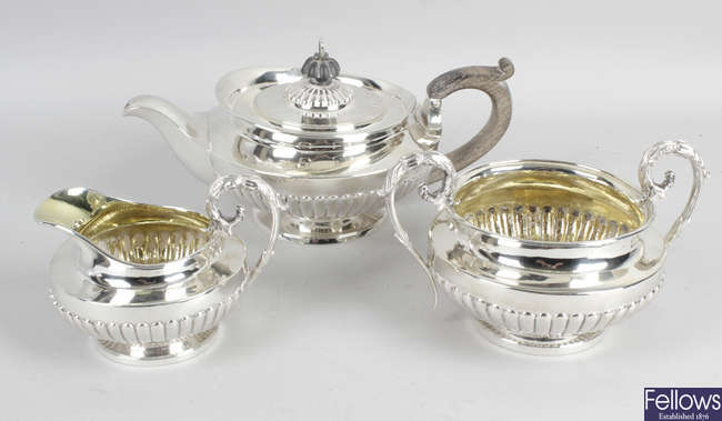 A George IV silver matched three piece tea service. 