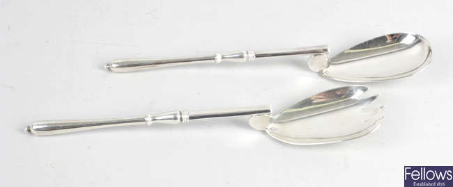 A pair of early 20th century silver salad servers. 