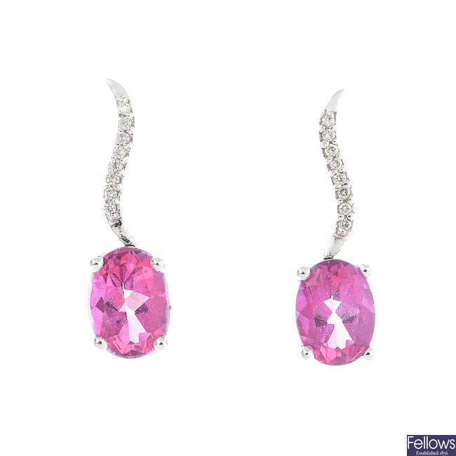 A pair of 9ct white gold coated pink topaz and diamond earrings.