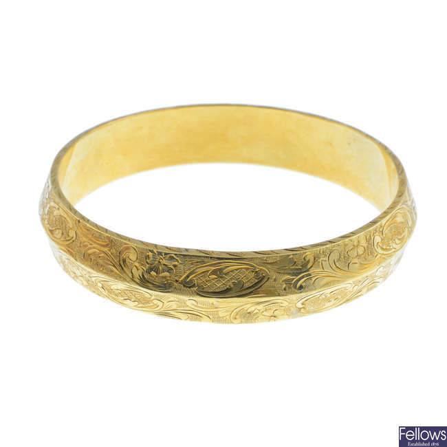 A late 19th century 14ct gold bangle.