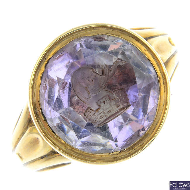 A mid 19th century gold amethyst seal signet ring.