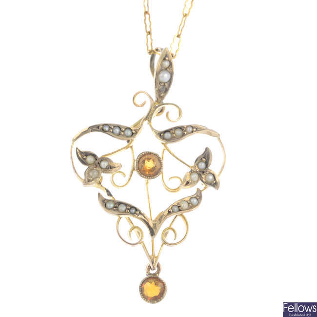 An early 20th century gold citrine and split pearl pendant, with chain.