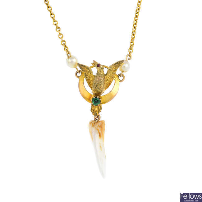 An early 20th century gold cultured pearl and gem-set necklace.