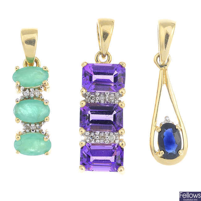 Nine diamond and gem-set pendants.